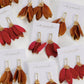 Garnet Gold Dipped Feather Statement Earrings